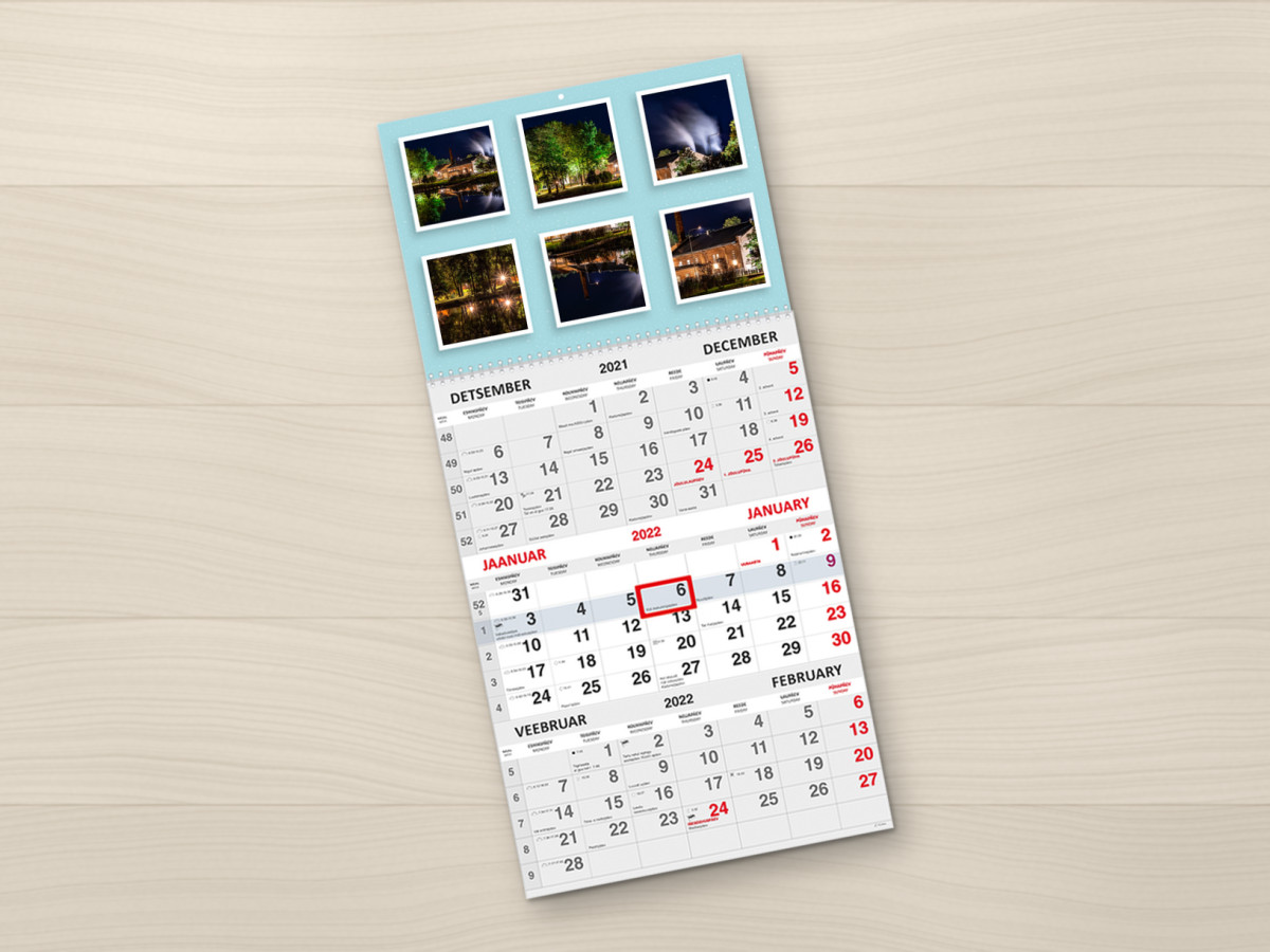 Trio kalender kuue fotoaknaga heledal puitpinnal